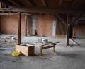Bild: szl
Der Turm der ehemaligen Brauerei Schels wird zum DAV-Kletterzentrum. Bei der Entkernung des Turms wird von oben nach unten gearbeitet und von Hand durchgeführt. Die leeren Etagen werden dann mit einem Stahlkorsett stabilisiert.