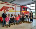 Bild: Ehemann/exb
Kinder bemalten und bepflanzten Kräuterkisten beim GOV Diendorf.