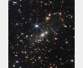 Bild: Space Telescope Science Institut/NASA/ESA/CSA/dpa
Der Galaxienhaufen SMACS 0723, aufgenommen mit dem „James Webb“-Teleskop. Die US-Raumfahrtbehörde Nasa hat den ersten Jahrestag des Beginns der wissenschaftlichen Arbeit des „James Webb“-Teleskops gefeiert.