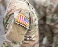Bild: Daniel Karmann/dpa
Die US-Flagge auf dem Oberarm der Uniform eines Soldaten der US-Army.