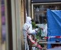 Bild: Eberlein/vifogra/dpa
Die Spurensicherung am Tatort, nachdem eine Mitarbeiterin in einem Blumenladen getötet worden ist.