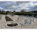 Bild: Corinna Hagn/exb
Kurz vor Allerheiligen wurde die neue Urnenwand samt Urnenhain auf dem Neustädter Friedhof fertig gestellt.