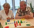 Bild: Ökumenische Sozialstation Sulzbach-Rosenberg/exb
"Mensch ärgere dich nicht" ist nur eines von vielen Spielen, die jeden Dienstagvormittag in der Sozialstation ausgepackt werden.