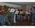 Bild: Astrid Senft/exb
Verschiedene Musikgruppen der Schule – im Bild die Bläserklasse - lockern die Veranstaltung mit weihnachtlichen Weisen auf.