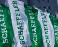 Bild: Daniel Karmann/dpa
Fahnen mit dem Schriftzug der Schaeffler AG wehen am Rande der Hauptversammlung des Unternehmens.