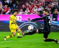 Bild: Tom Weller/dpa
Karim Adeyemi (l) brachte den BVB früh in Führung.