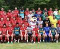 Bild: Janne
Die vier teilnehmenden Teams beim Jahn-Partnertag in Mintraching: Rechts sitzen die Kicker des FC OVI/Teunz.