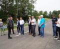 Bild: wel
Vertreter des Landratsamts, der Baufirma Dankerl sowie Kreisräte begutachten die Kreisstraße SAD 43, die voll ausgebaut wurde