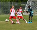 Bild: Nachtigall
Die Bayern (rot-weiße Trikots) besiegten im Finale den SSV Jahn.