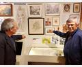 Bild: lg
Theo Männer (rechts) und Reiner Reisinger verweisen auf aufschlussreiche Details bei den Landkarten und Bildern zu Pfalzgraf Johann und der Hussitenschlacht 1433 bei Hiltersried.