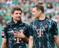 Bild: Sina Schuldt/dpa
Thomas Müller (l) und Manuel Neuer nehmen zum Start ins Fußballjahr besondere Rollen ein.