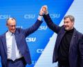 Archivbild: Daniel Karmann/dpa
Bereits beim kleinen CSU-Parteitag in Nürnberg hatten sich die Spitzen der Union gegenseitig auf der Bühne gefeiert und die Tage bis zur Regierungsübernahme gezählt.