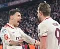 Bild: Peter Kneffel/dpa
In der Champions League oben auf: Harry Kane feiert mit Leon Goretzka nach seinem Tor zum 1:0.