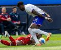 Bild: Ringo Chiu/ZUMA Press Wire/dpa
Alphonso Davies (unten) verletzte sich im Länderspiel gegen die USA.