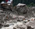 Bild: Channi Anand/AP/dpa
Die Wassermassen überraschten Pilger beim Essen. Mindestens 65 Menschen sind in Kaschmir bei einer Sturzflut gestorben.