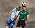 Bild: Friso Gentsch/dpa
Kopfballduell zwischen dem Münsteraner Paul Jaeckel (rechts) und Herthas Dawid Kownacki.