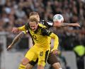 Bild: Sina Schuldt/dpa
Enttäuschung in Gelb: Julian Brandt und der BVB.