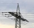 Symbolbild: Roberto Pfeil/dpa
Ein Strommast steht vor grauen Wolken. In einigen Teilen von Luhe-Wildenau ist am Donnerstagmorgen der Strom ausgefallen.