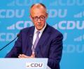 Bild: Thomas Banneyer/dpa
Der Kanzler bereitet die Bürgerinnen und Bürger auch auf „Einschnitte“ vor.