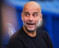 Bild: Adam Davy/PA Wire/dpa
Nach der Einigung darf sich Pep Guardiola auf einen Geldregen für Manchester City freuen.