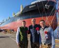 Archivbild: MINSHIP Shipmanagement GmbH &amp; Co. KG/exb
Matthias M. Ruttmann (Mitte) bei einer Schiffstaufe.