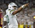 Bild: Matt Ludtke/AP/dpa
Packers-Quarterback Jordan Love darf jubeln.