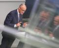 Bild: Michael Kappeler/dpa
Der Kanzler verteidigt im Bundestag seinen Reformkurs.