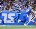 Bild: Rey Del Rio/FR171574 AP/AP/dpa
Kommt nach vier Spielen schon auf sechs Touchdowns: Amon-Ra St. Brown (Mitte).