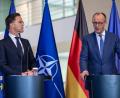 Bild: Michael Kappeler/dpa
Kanzler Merz und Nato-Generalsekretär Rutte treten gemeinsam vor die Presse.