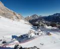 Bild: Alessandro Trovati/AP/dpa
Die Tofane-Strecke wird ein bedeutender Teil der Olympischen Winterspielen 2026 in Cortina d'Ampezzo sein. In der Region ist die Schneehöhe deutlich gesunken. (Archivbild)