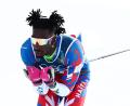 Bild: Daniel Karmann/dpa
Stevenson Savart aus Haiti fällt bei den Langlauf-Wettbewerben auf.  (Archivbild)