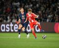 Bild: Federico Gambarini/dpa
Teilnehmer eines verrückten Spiels: Joshua Kimmich (r).