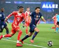 Bild: Federico Gambarini/dpa
Hohes Tempo, viele Tore: Michael Olise (l) und die Bayern lieferten in Paris ein Spektakel.