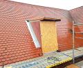 Bild: Michael Götz
Der Transport sperriger Materialien wurde für alle Bauhandwerker enorm erleichtert durch diesen seitlichen Zugang über ein eigens errichtetes Treppenhaus aus Gerüstelementen.
