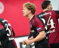 Bild: Daniel Karmann/dpa
Piet Scobel beim Torjubel. Der 1. FC Nürnberg setzt auch in Zukunft auf den Stürmer. (Archivbild)