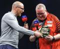 Bild: Andreas Gora/dpa
Mark Webster als TV-Experte bei der Premier League.