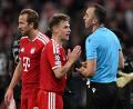 Bild: Sven Hoppe/dpa
Am Mittwochabend keine Freunde: Joshua Kimmich reklamiert bei Schiedsrichter Joao Pinheiro.