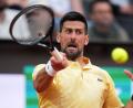 Bild: Andrew Medichini/AP/dpa
Verliert überraschend in Runde zwei: Novak Djokovic.
