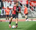 Bild: Daniel Karmann/dpa
Der vom FC Augsburg ausgeliehene Außenverteidiger Henri Koudossou zählte auch zu den verabschiedeten FCN-Profis. (Archivbild)