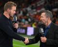 Bild: Federico Gambarini/dpa
Julian Nagelsmann (l) sollte aus Sicht von Lothar Matthäus mehr Bundesliga-Spiele live im Stadion sehen. (Archivbild)
