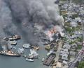Bild: -/kyodo/dpa
Das Feuer soll sich zunächst von ausrangierten Schiffen ausgebreitet haben.