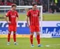 Bild: Jan-Philipp Strobel/dpa
Budu Siwsiwadse und Jan Schöppner steigen mit Heidenheim ab.