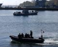 Bild: Marcus Brandt/dpa
Minentaucher der Bundeswehr in einem Schlachboot.