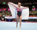 Bild: Hiro Komae/AP/dpa
Kann künftig wieder mit russischer Flagge posieren: Angelina Melnikowa. (Archivbild)