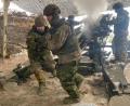 Bild: Alexander Welscher/dpa
Kanadische Soldaten üben in Lettland.