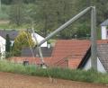 Bild:  Bernd März/ extremwetter.tv /dpa
Ein Leitungsmast in Deusmauer, Gemeindeteil der Stadt Velburg im Landkreis Neumarkt in der Oberpfalz, ist umgeknickt.