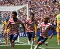 Bild: Ted S. Warren/AP/dpa
Ein Eigentor ließ das US-Team früh jubeln.