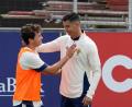 Bild: Armando Franca/AP/dpa
Spielen gemeinsam für Portugal: Joao Neves und Cristiano Ronaldo (r).