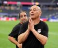 Bild: Tony Gutierrez/AP/dpa
Könnte Ärger mit der FIFA bekommen: Ägyptens Trainer Hossam Hassan.