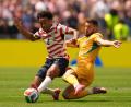 Bild: Abbie Parr/AP/dpa
Tyler Adams (l) ist ein Führungsspieler des US-Teams. (Archivbild)